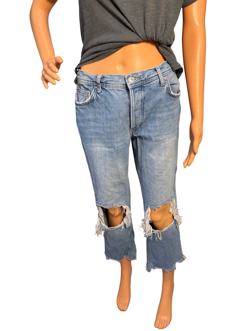 We The Free distressed flare crop jeans with holes in the knees and freyed hem